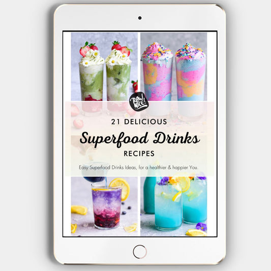 A digital tablet displaying a recipe e-book cover for '21 Delicious Superfood Drinks' with various colorful drinks and ingredients illustrated in the background.